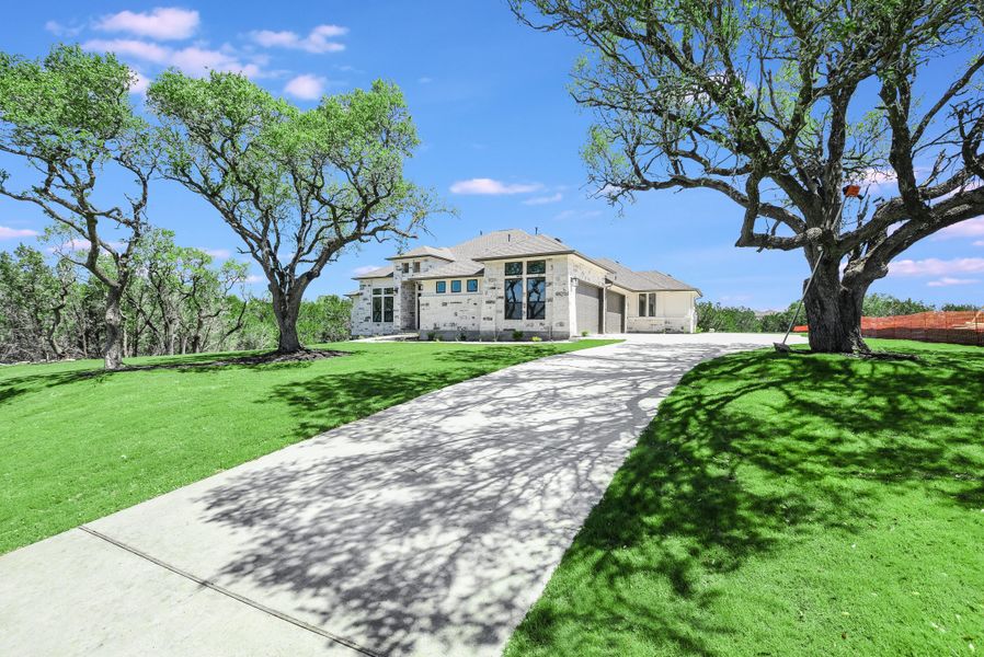 Representative exterior photo of a completed home built from the San Simeon I by Giddens Homes in Clearwater Ranch, Liberty Hill, TX (Image 59).