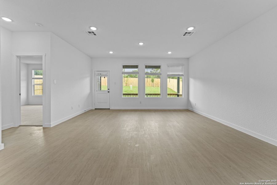 Spacious, unfurnished interior of a new home in Waterwheel: Coastline Collection, San Antonio (Image 16).