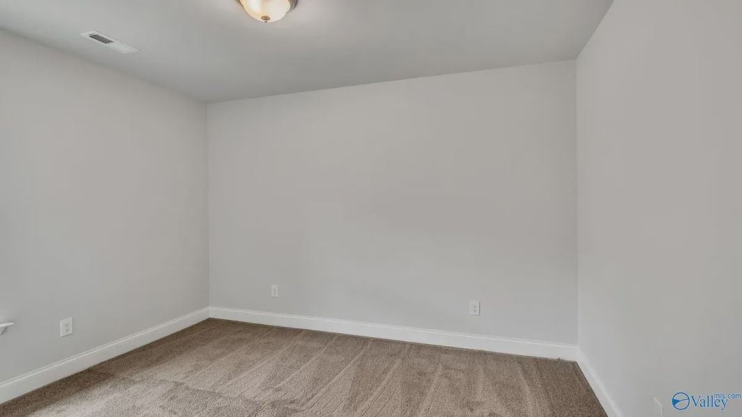 Representative unfurnished interior of a home built from the 1434 by Adams Homes in The Grove at Ballard Park, Jacksonville (Image 20).