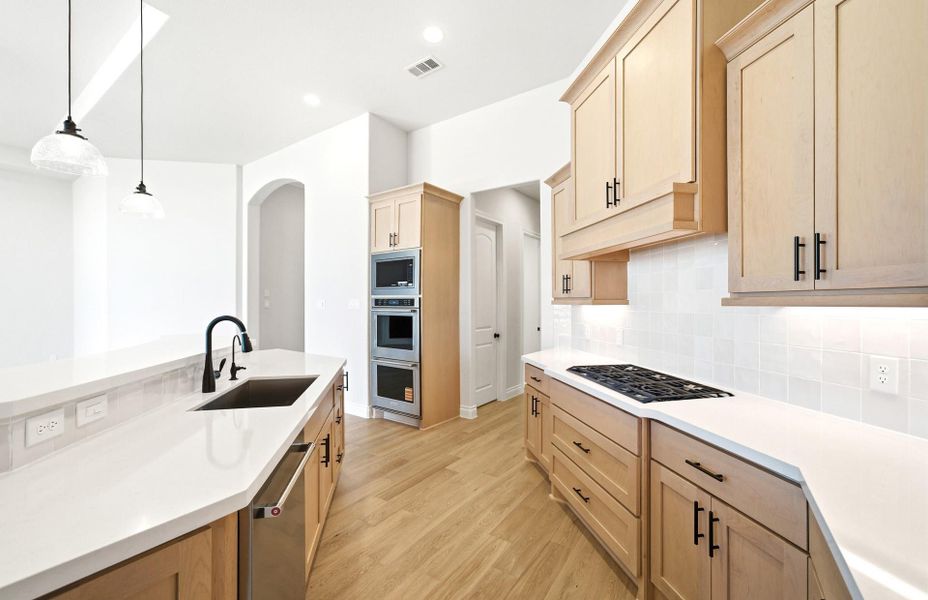 Furnished interior view inside a new home in Bridgeland 60′, Cypress (Image 13).