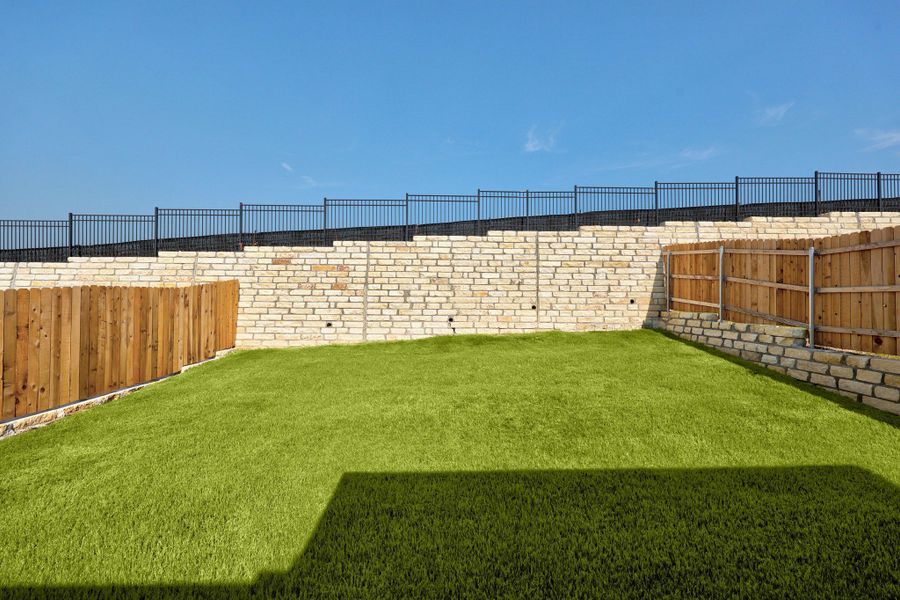 Exterior details and patio area of a home in Lakeside at Tessera, Lago Vista (Image 25).