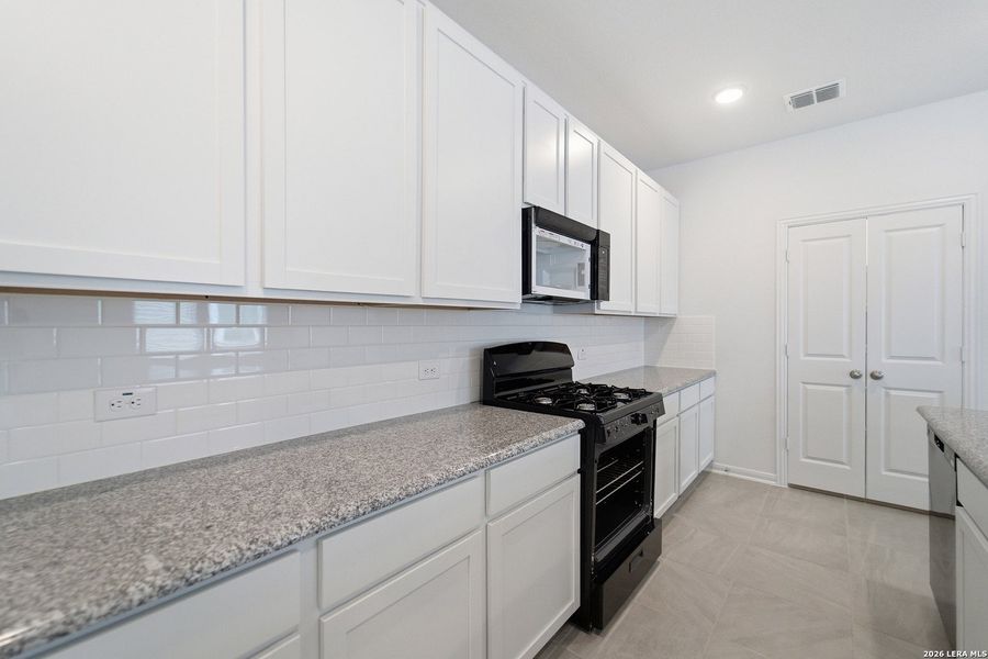 Furnished interior view inside a new home in Red Hawk Landing, San Antonio (Image 7).