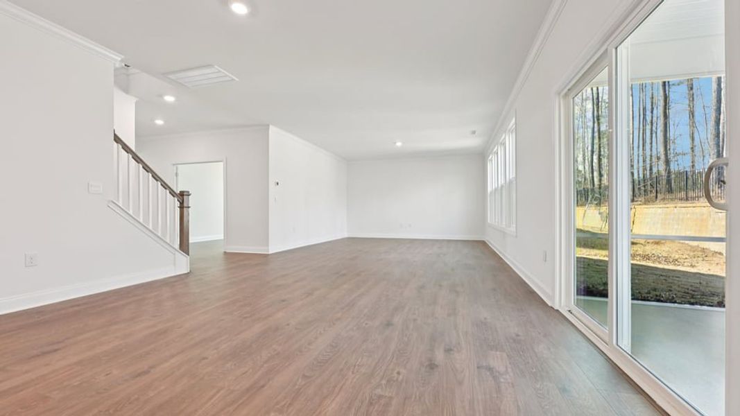 Representative unfurnished interior of a home built from the Wylie by D.R. Horton in Eagle Creek, Fuquay Varina (Image 14).