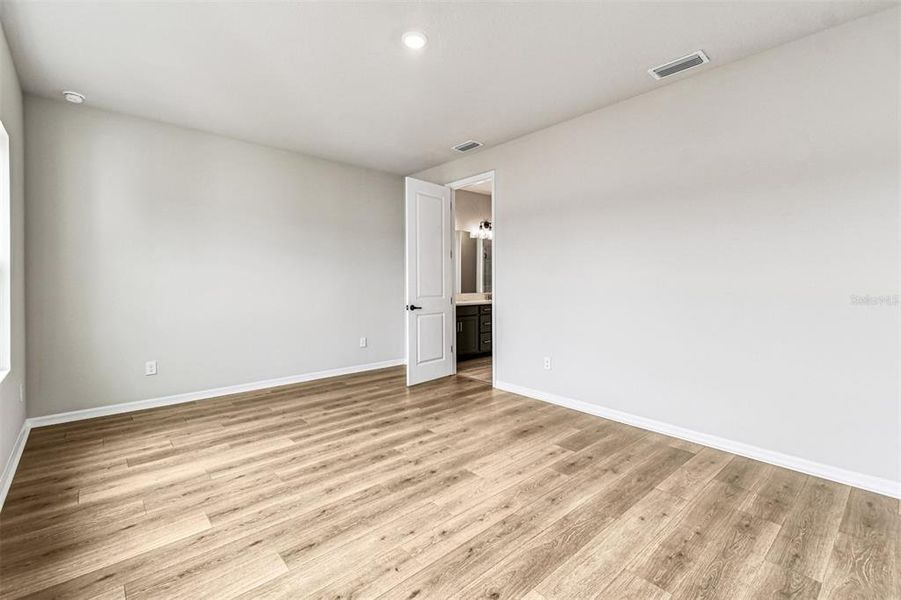 Spacious, unfurnished interior of a new home in Oakfield at Mount Dora Village Series, Mount Dora (Image 45).