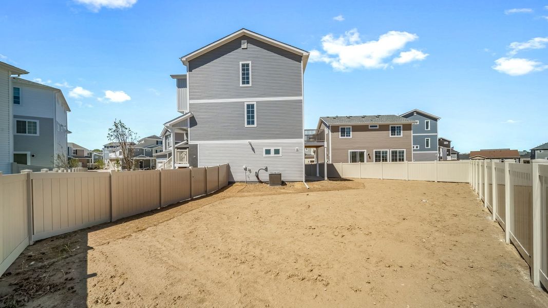 Exterior details and patio area of a home in Thompson River Ranch, Johnstown (Image 3).