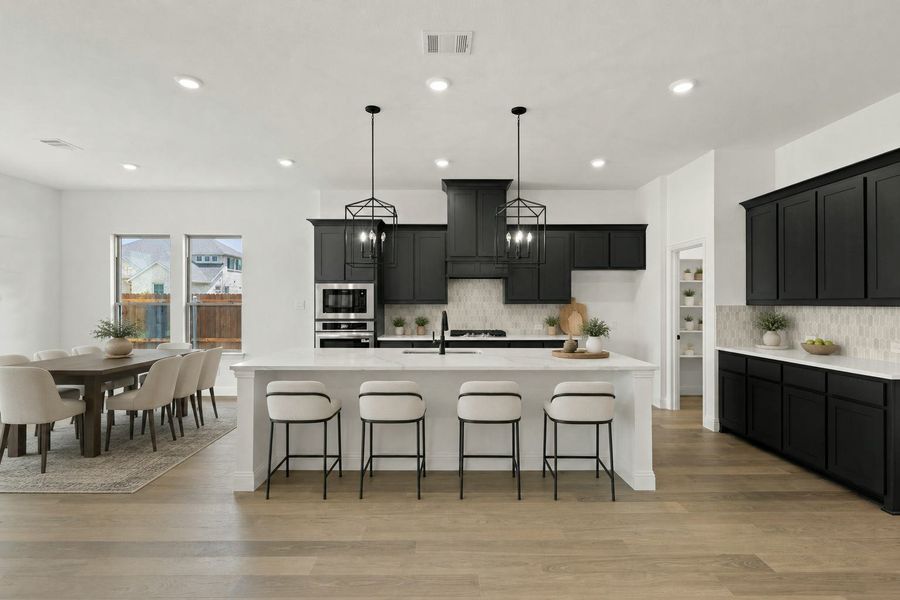 Representative furnished interior of a home built from the Houston by Kindred Homes in Westside Preserve, Midlothian (Image 6).