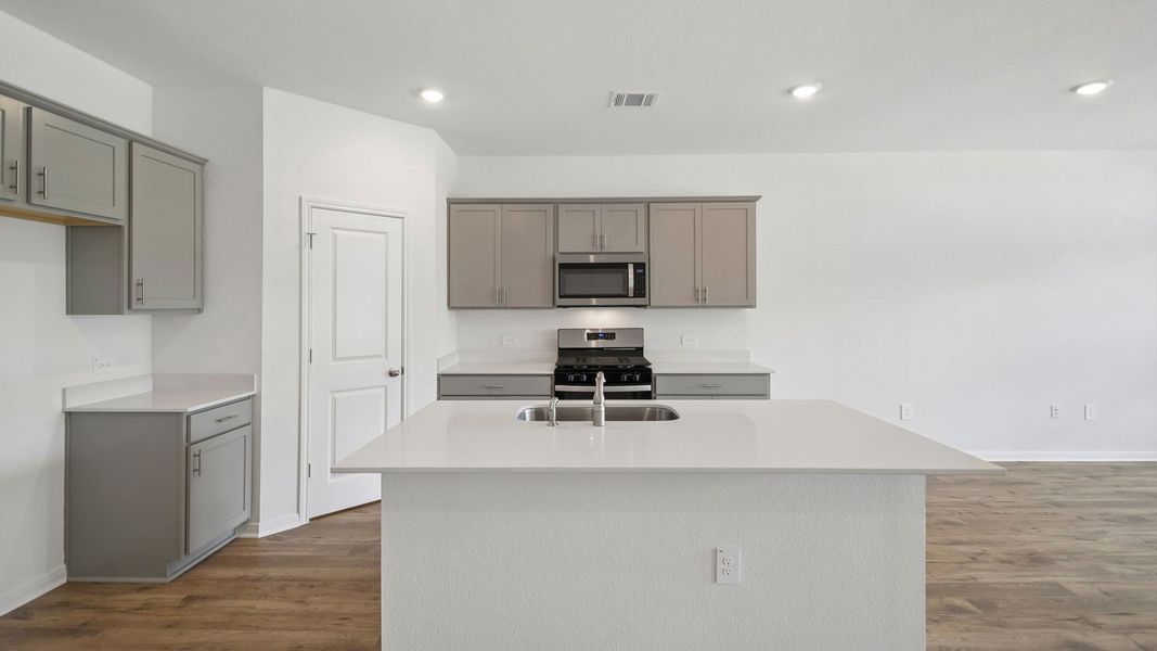 Furnished interior view inside a new home in Prairie Lakes, Buda (Image 7).