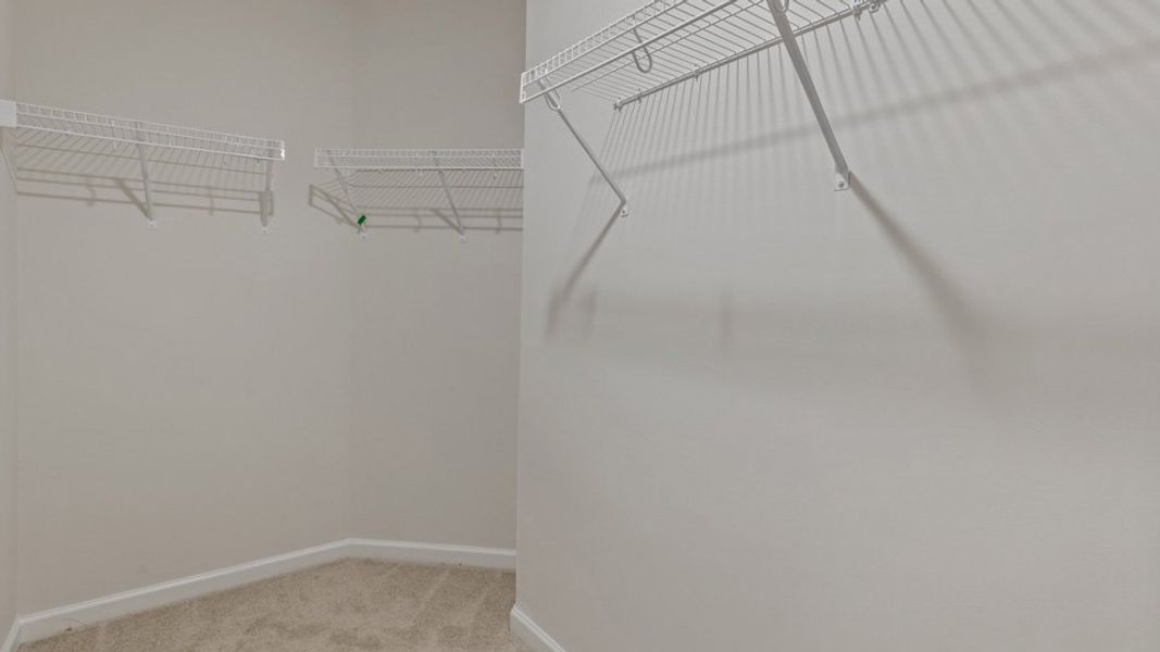 Spacious, unfurnished interior of a new home in The Grove at Matthews Landing, Fuquay Varina (Image 30).