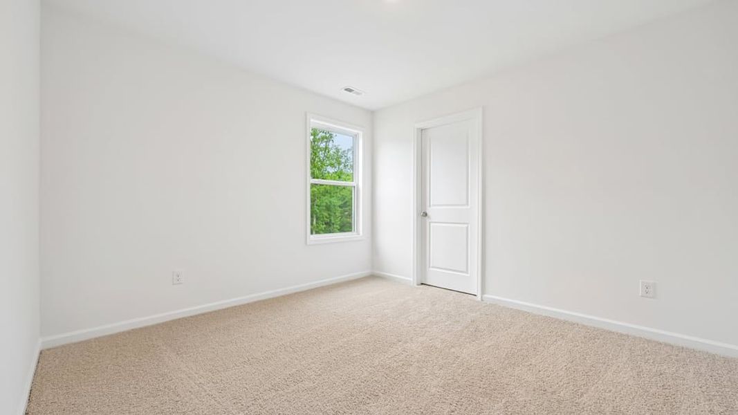 Spacious, unfurnished interior of a new home in Kalas Falls, Wake Forest (Image 25).