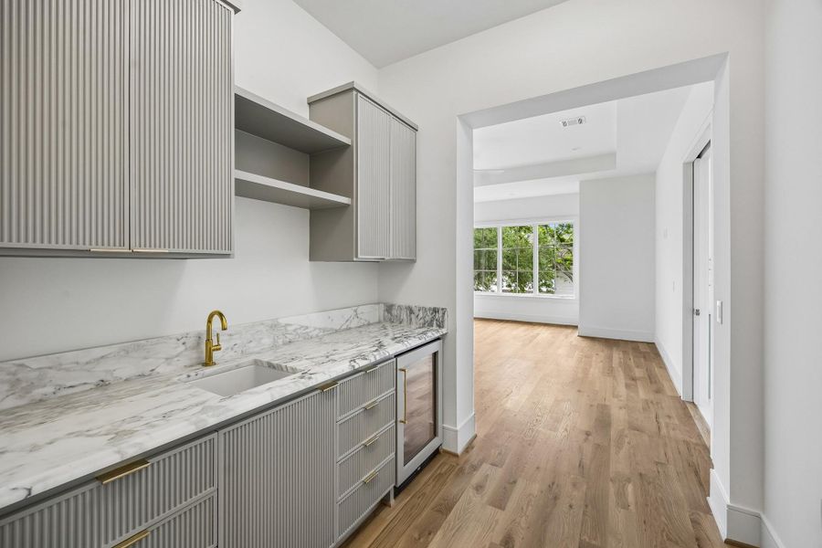 Furnished interior view inside a new home in , West University Place (Image 9).