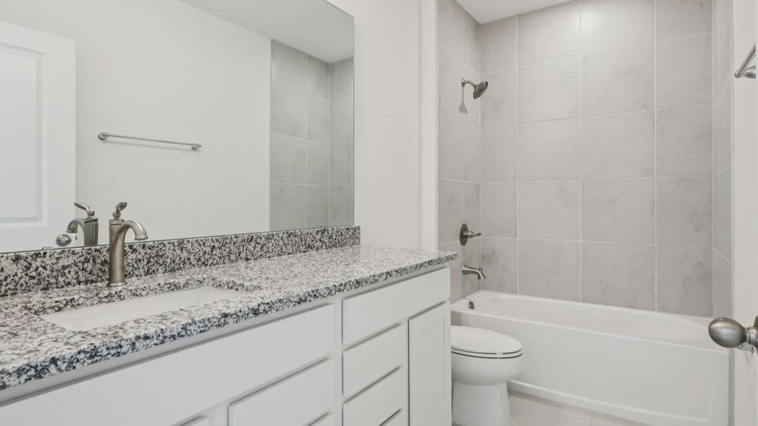 Bathroom of the Baker Floor Plan by DRB Homes in Liberty Trace New Homes in Haines City