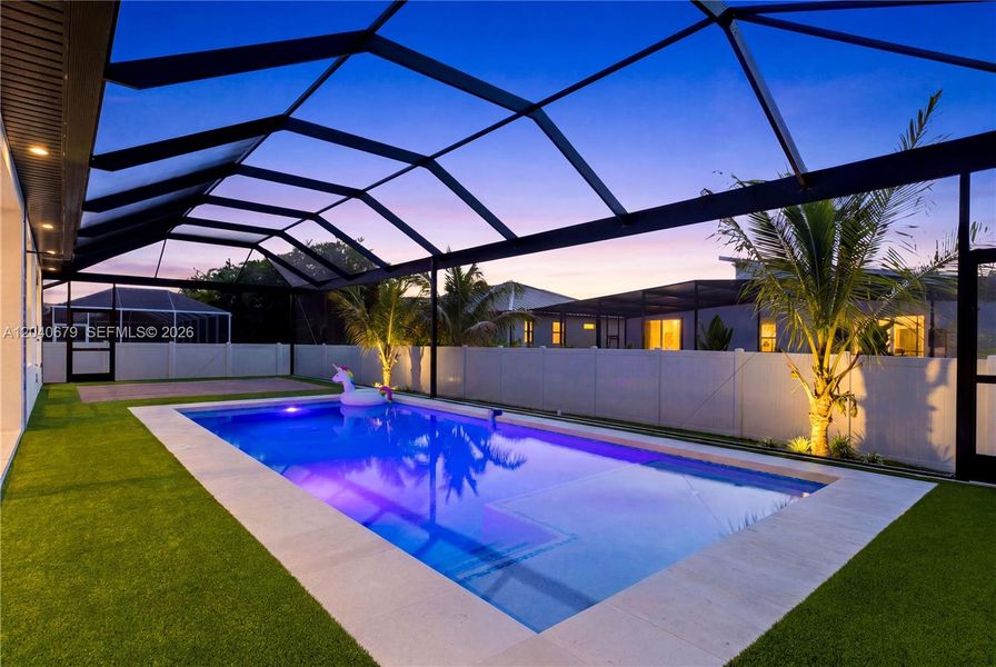 Start your mornings w/ beautiful eastern rear exposure & abundant natural light while enjoying coffee poolside in your private tropical retreat!