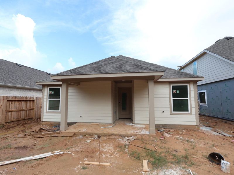 Front exterior of a new home in Sorella, Tomball, TX, highlighting curb appeal (Image 15). Front exterior of a new home in Sorella, Tomball, TX, highlighting curb appeal (Image 15).