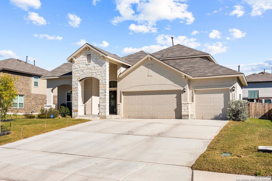 Front exterior of a new home in , Cibolo, TX, highlighting curb appeal (Image 2). Front exterior of a new home in , Cibolo, TX, highlighting curb appeal (Image 2).