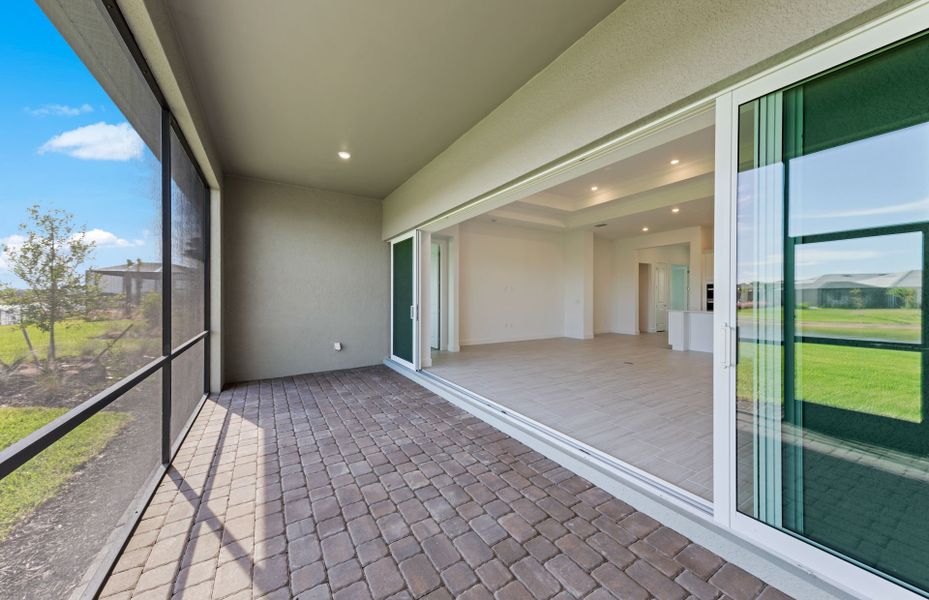 Exterior details and patio area of a home in TerraWalk at Babcock Ranch, Alva (Image 2). Exterior details and patio area of a home in TerraWalk at Babcock Ranch, Alva (Image 2).