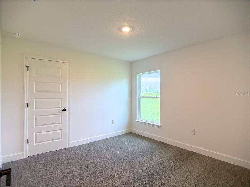 Spacious, unfurnished interior of a new home in Hill Country Estates, Dade City (Image 12).