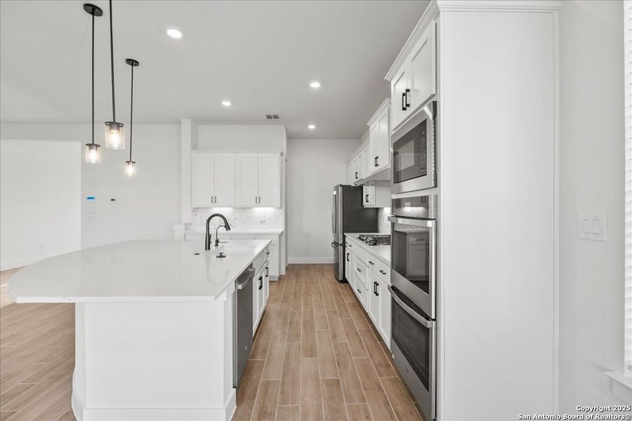 Furnished interior view inside a new home in Village at Three Oaks, Seguin (Image 10).