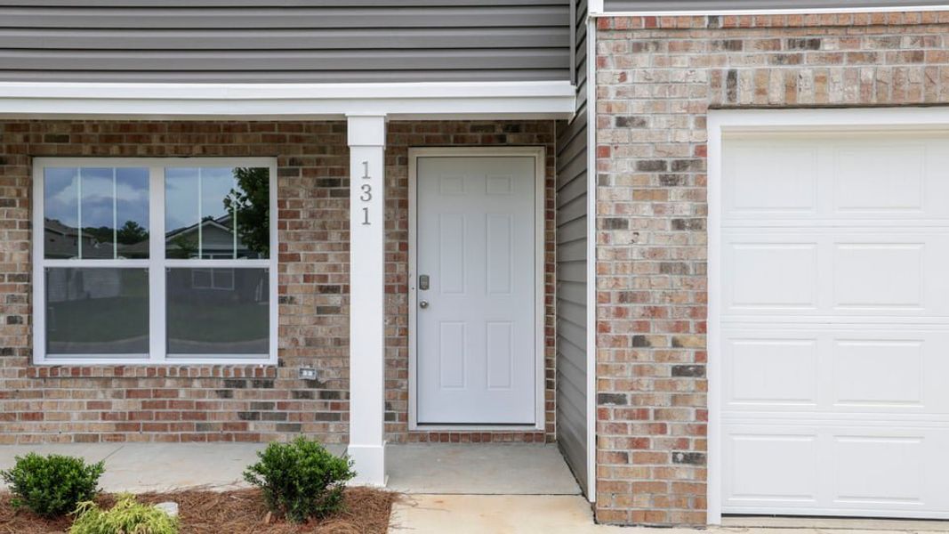 Exterior details and patio area of a home in Bentley Park, Greenwood (Image 2). Exterior details and patio area of a home in Bentley Park, Greenwood (Image 2).