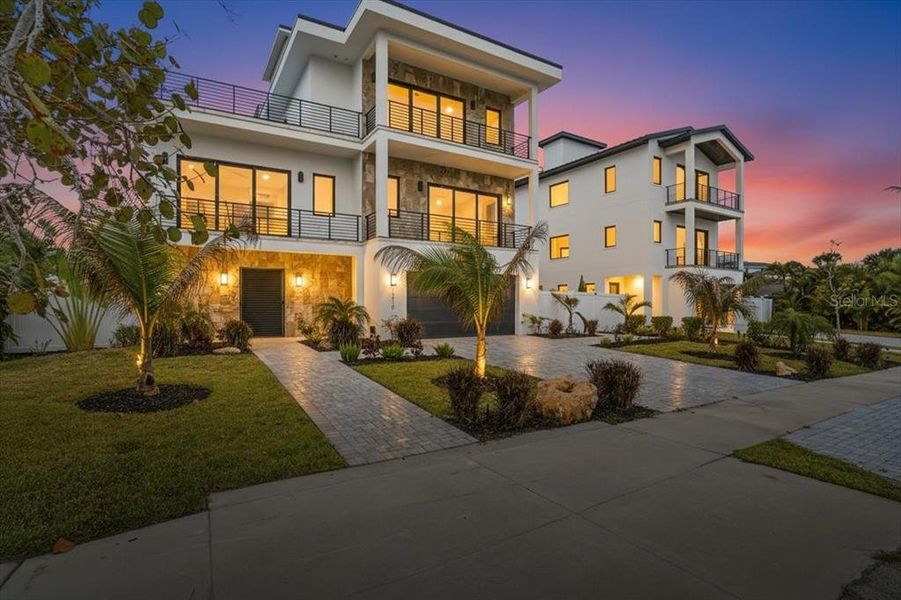Front exterior of a new home in , Englewood, FL, highlighting curb appeal (Image 26).