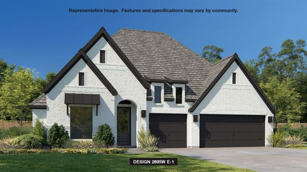 View of front of house featuring a garage and a front yard