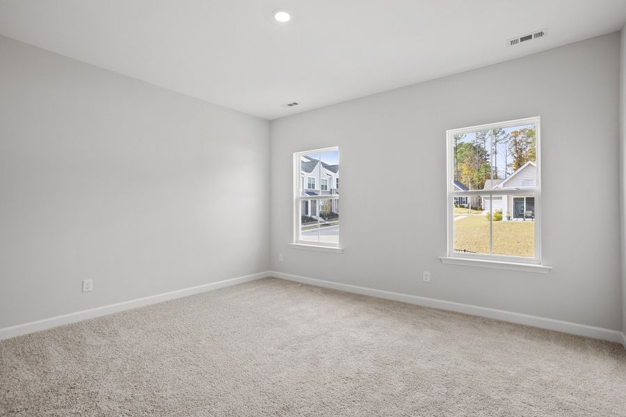 Spacious, unfurnished interior of a new home in Renaissance at White Oak, Garner (Image 21).