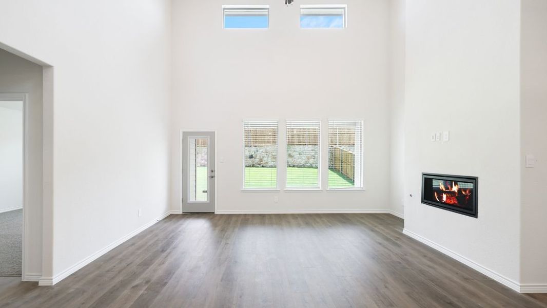 Representative unfurnished interior of a home built from the Burrow by D.R. Horton in The Landing at Hidden Lakes, McKinney (Image 15).
