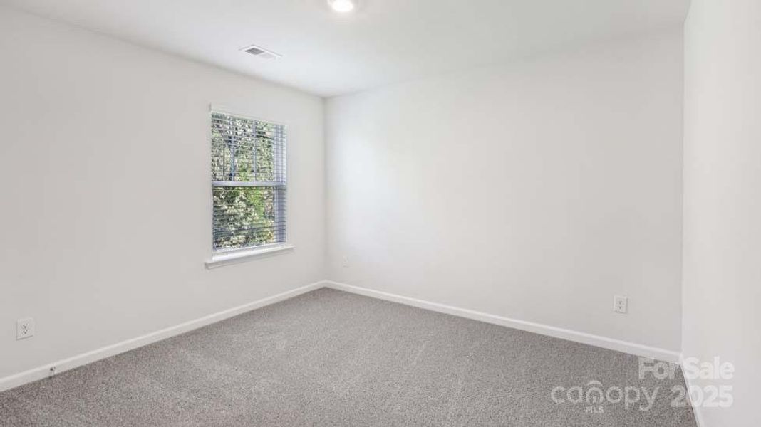 Spacious, unfurnished interior of a new home in Wallace Springs, Statesville (Image 35).