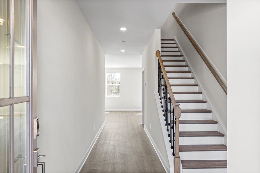 A staircase in a house. A staircase in a house.