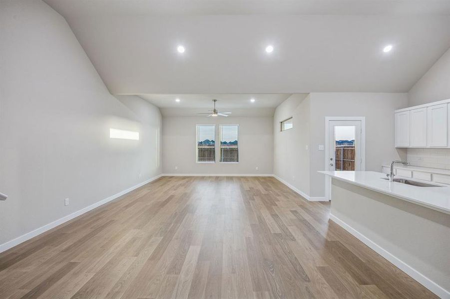 Open First Floor in the Wimbledon home plan by Trophy Signature Homes – REPRESENTATIVE PHOTO