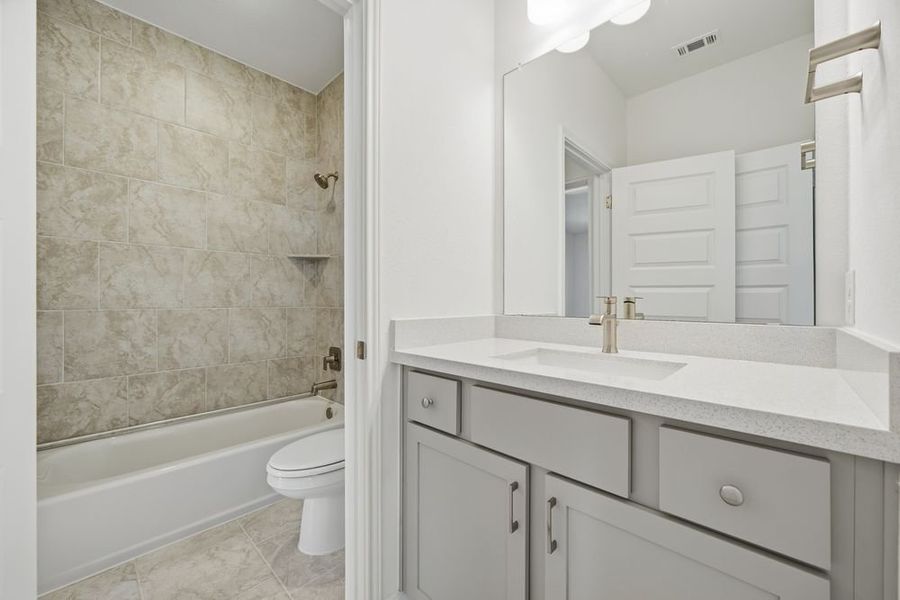 Furnished interior view inside a new home in Parkside on the River 60s, Georgetown (Image 12).