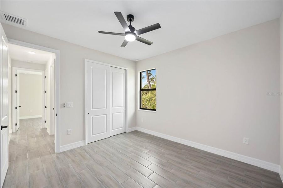 Spacious, unfurnished interior of a new home in , Port Charlotte (Image 40).