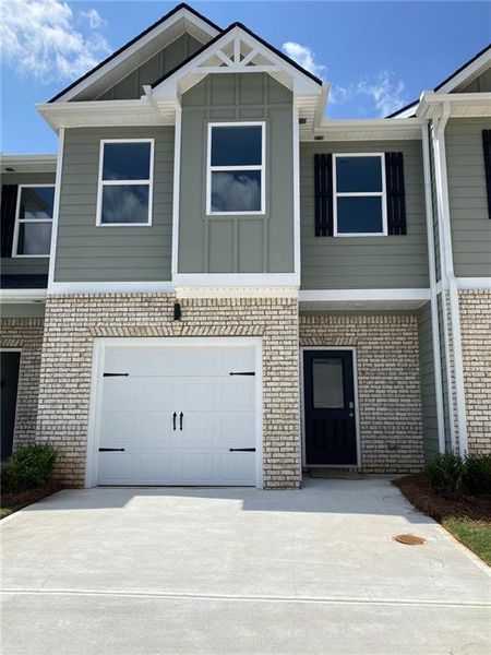 Front exterior of a new home in Carolina, Palmetto, GA, highlighting curb appeal (Image 1). Front exterior of a new home in Carolina, Palmetto, GA, highlighting curb appeal (Image 1).