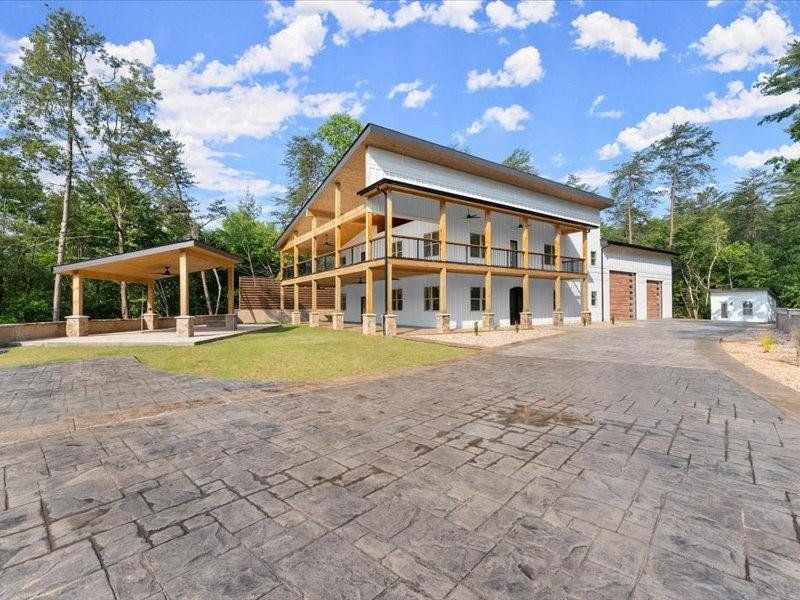 Front exterior of a new home in , Dahlonega, GA, highlighting curb appeal (Image 33).