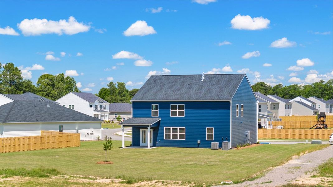Front exterior of a new home in Southwind Village, Evans, GA, highlighting curb appeal (Image 24).
