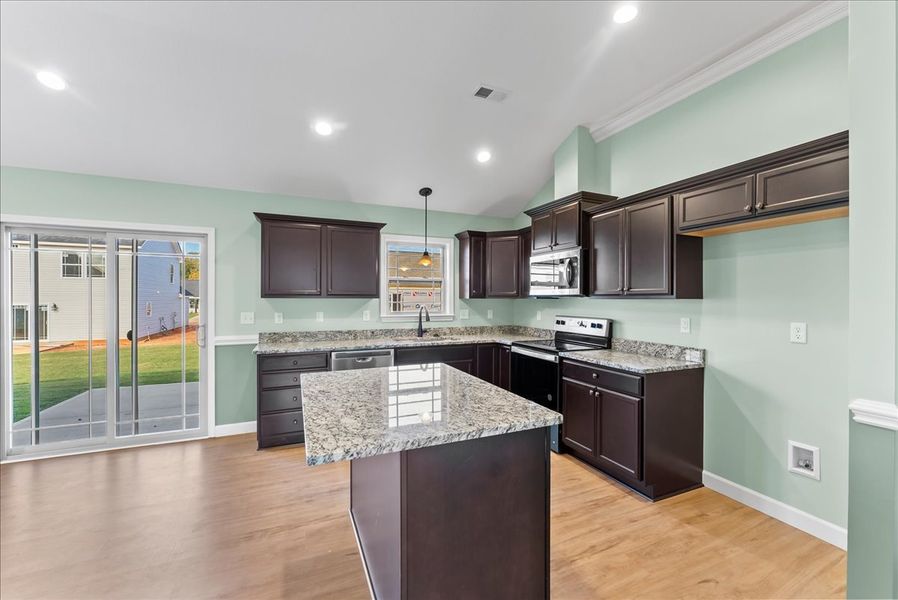 Representative furnished interior of a home built from the Rozlynn by Enchanted Homes in New Prospect Haven, Inman (Image 5).