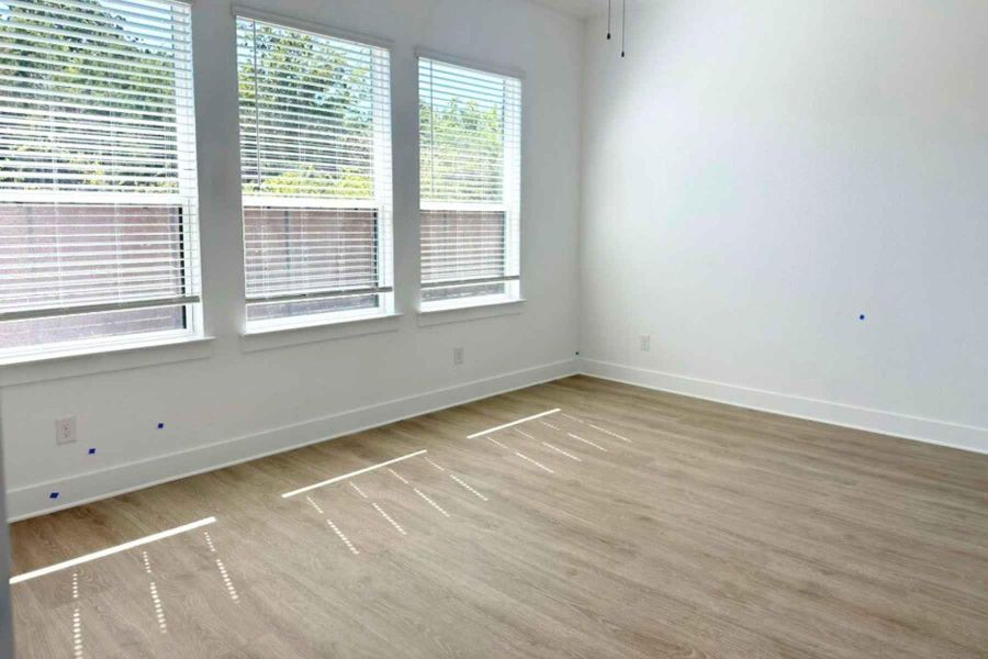 Empty room with light wood-type flooring Empty room with light wood-type flooring