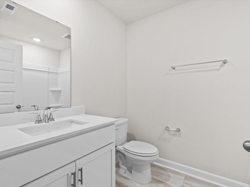 Furnished interior view inside a new home in Crossing at Abner Creek Townes, Greer (Image 9).