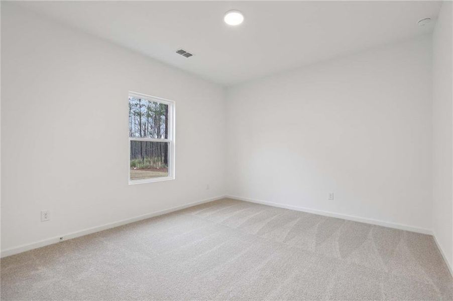 Spacious, unfurnished interior of a new home in The Pointe at Heron Bay, Locust Grove (Image 12).