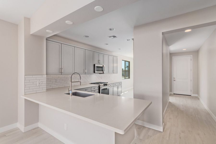 Representative furnished interior of a home built from the Lily by Taylor Morrison in CantaMia at Estrella 55+, Goodyear (Image 2).