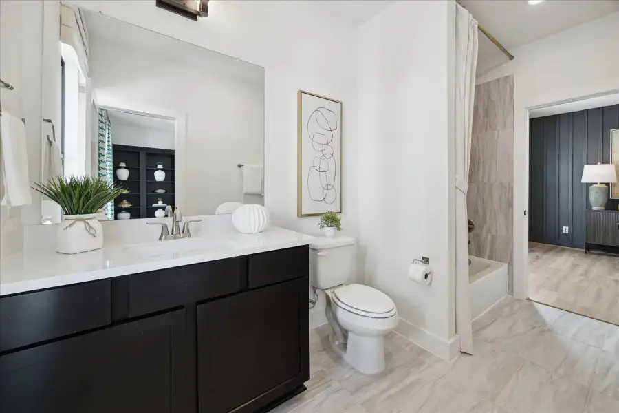 Representative furnished interior of a home built from the The 2824 by Autograph Homes in Caywood, Houston (Image 15).