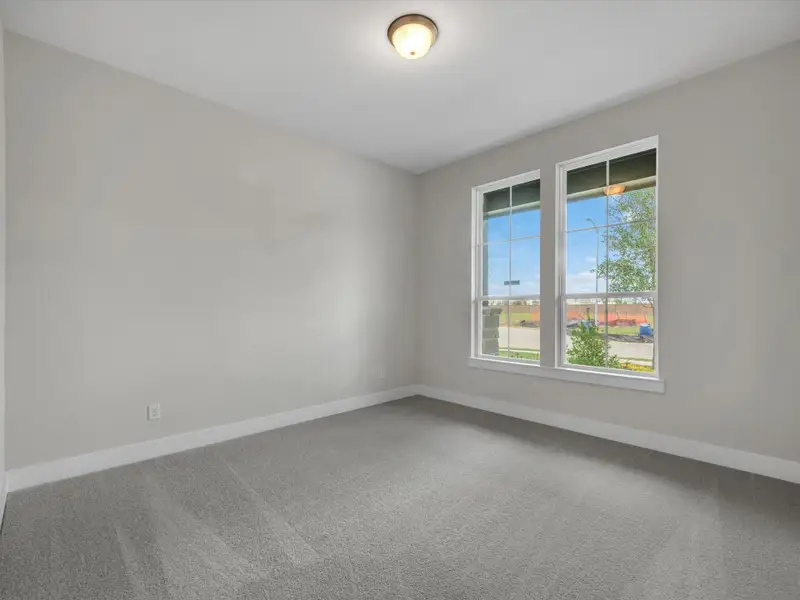 Spacious, unfurnished interior of a new home in Dunham Pointe, Cypress (Image 14).
