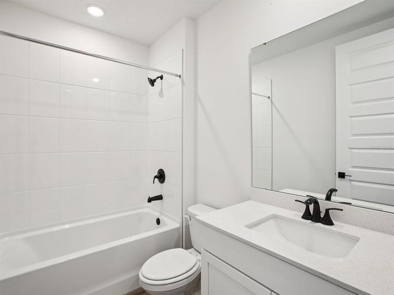 Furnished interior view inside a new home in Two Rivers - Signature Series, Zephyrhills (Image 13). Furnished interior view inside a new home in Two Rivers - Signature Series, Zephyrhills (Image 13).