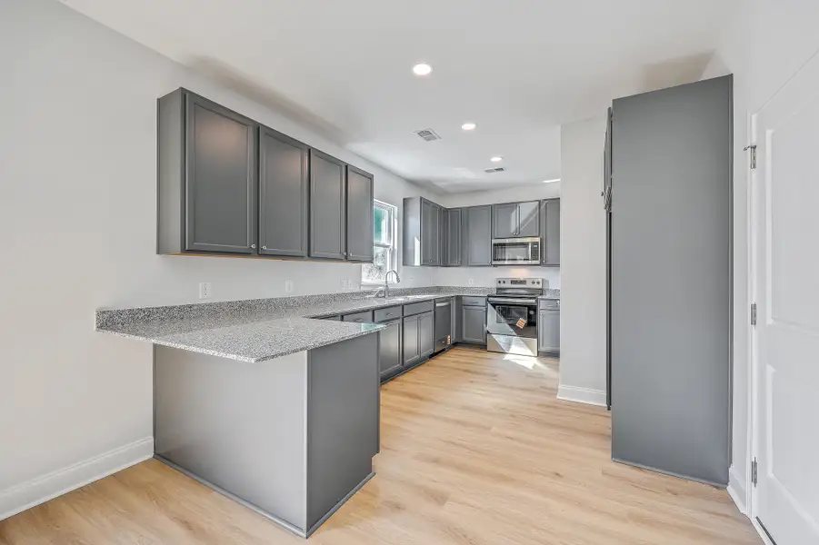 Furnished interior view inside a new home in , Holly Hill (Image 5).