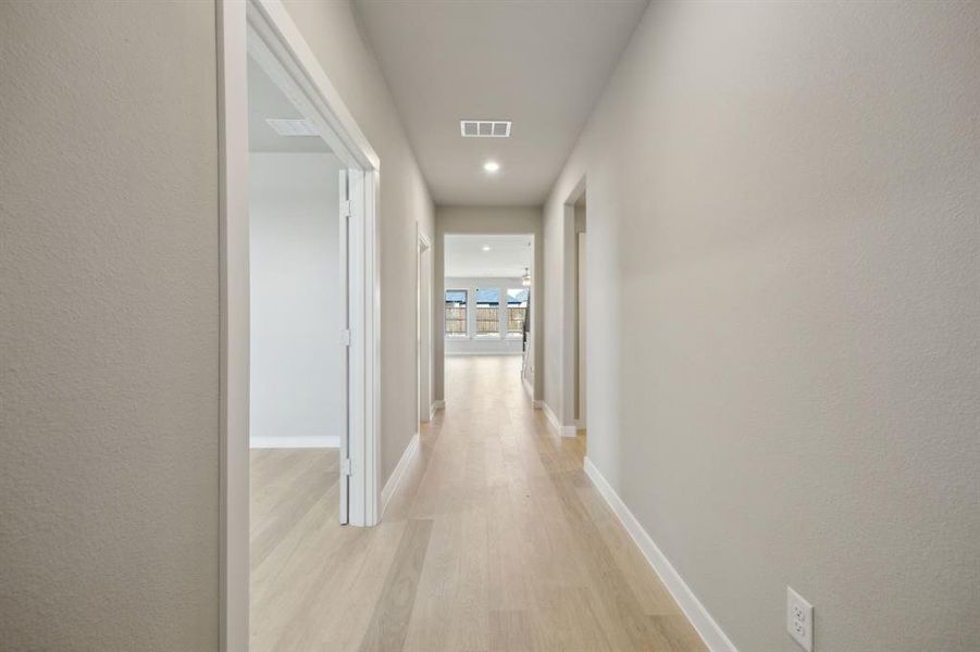 The entry to the home showcases the beautiful floors