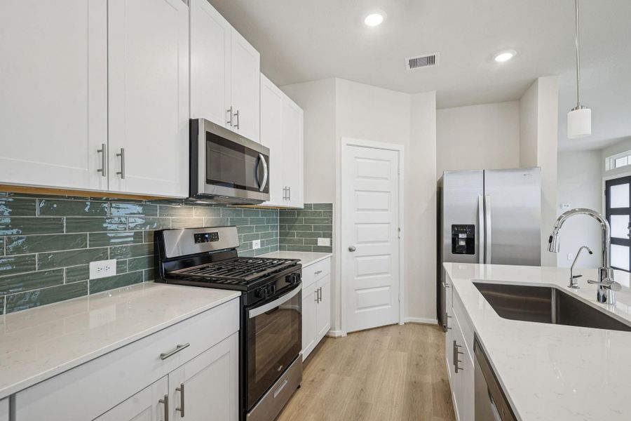 Furnished interior view inside a new home in Pinewood Trails - City Series, Atascocita (Image 11).