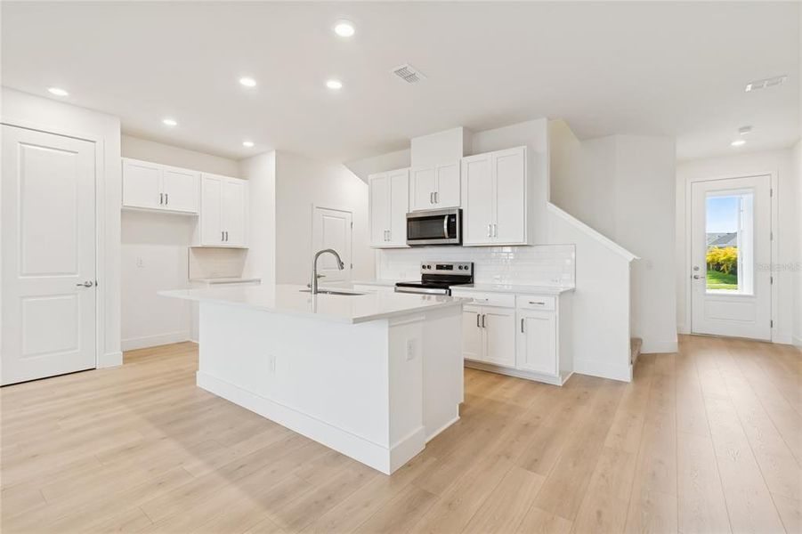 Furnished interior view inside a new home in North River Ranch – Townhomes, Parrish (Image 13).