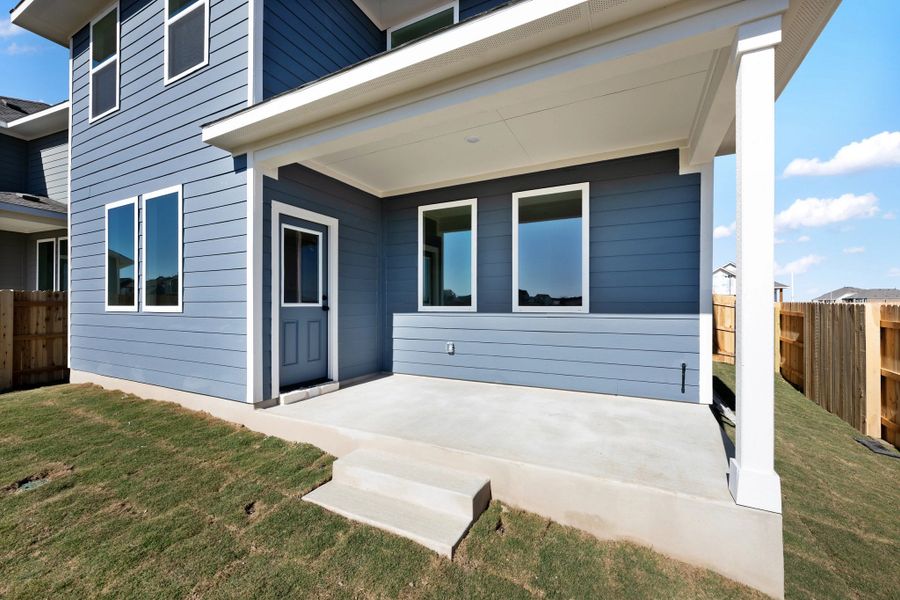Exterior details and patio area of a home in The Homestead at Lariat, Liberty Hill (Image 30).