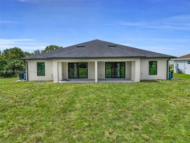 Exterior details and patio area of a home in , Lehigh Acres (Image 1). Exterior details and patio area of a home in , Lehigh Acres (Image 1).