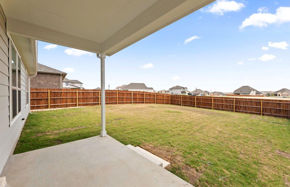 Exterior details and patio area of a home in Saddleback at Santa Rita Ranch, Liberty Hill (Image 3).