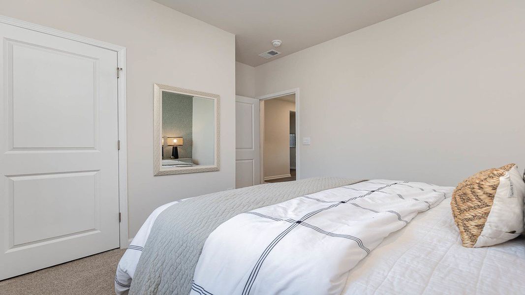 Furnished interior view inside a new home in Rich Square at Brunswick Plantation, Ash (Image 13).